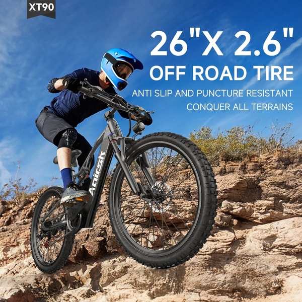 Aairsk XT90 rijder met helm op rotsachtig terrein met 26 bij 2,6 inch antislip- en lekvrije off-road banden