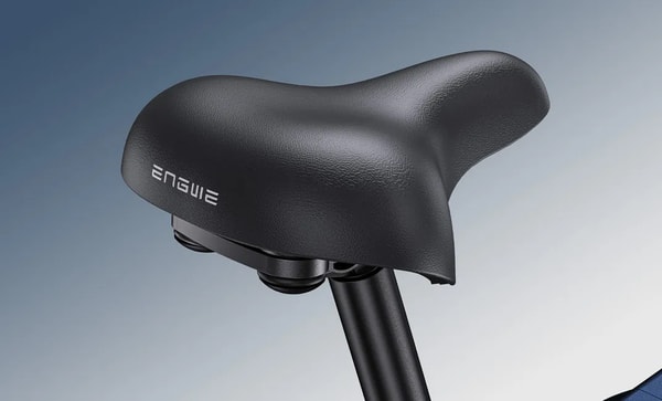 Close-up of the black Engwe branded comfort saddle and seatpost clamp on the Engine Pro 3.0 Boost folding electric fat bike