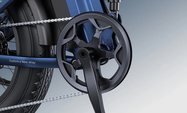 Close-up of the chainring, crank arm and chain on the blue Engwe Engine Pro 3.0 Boost folding fat bike with the Explore a New Way frame decal above the rear wheel