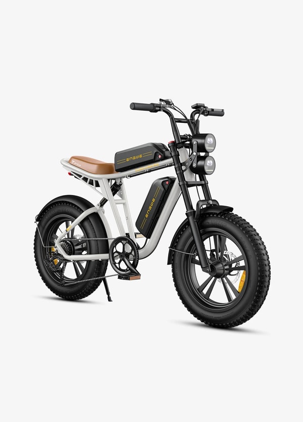 White Engwe M20 dual-battery electric fat bike shown from the front three-quarter angle with two batteries, long saddle, rear suspension and fat tires