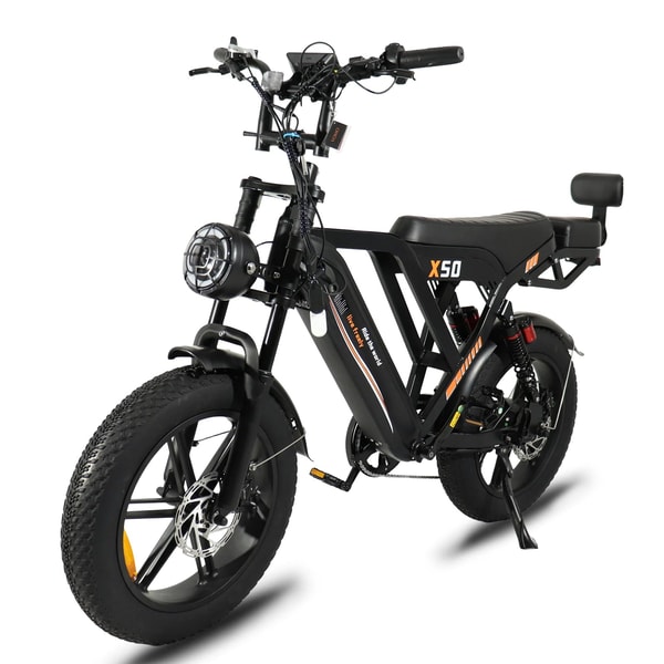 Black VOMO X50 electric fat bike shown from the front three-quarter angle with round headlight, long seat, rear suspension and wide tires
