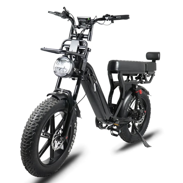 Black VOMO X70 cargo electric fat bike shown from the front three-quarter angle with round headlight, front cargo rack, removable battery, dual suspension and wide front tire